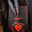 Black and red heart pen and penholder set, gothic event decor.
