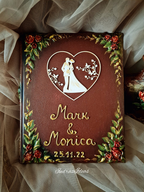 Couple silhouette in heart guest book. Red roses, brown, gold decor. S/L books un sets