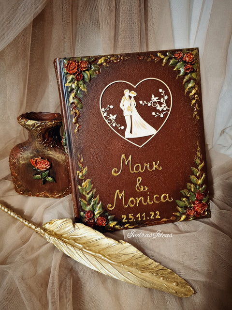 Couple silhouette in heart guest book. Red roses, brown, gold decor. S/L books un sets