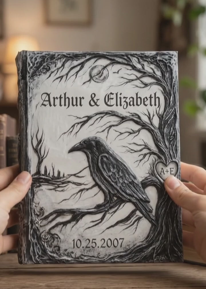 Handcrafted 3D gothic raven wedding guest book featuring sculpted tree branches, carved heart with initials, and personalized names and date