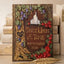 A decorative embossed journal styled like an antique fantasy book, featuring a castle motif, roses, grapes, and the text 'Once Upon a Time September 25 2026'. It is displayed upright on a tabletop with a gold feather pen in front and stacked books in the background.