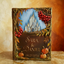 Personalized handmade hardcover Autumn wedding guest book  The cover features a painted blue sky with a 3D white castle, autumn leaves, red berries, and small pumpkins, with the names 'SARA & DANIEL' and the date