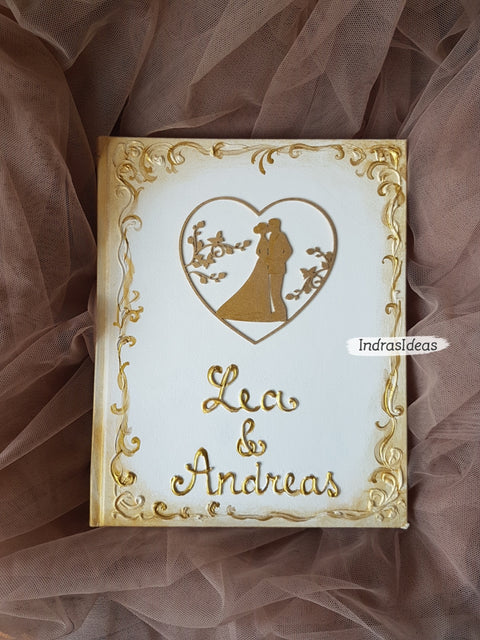 Newlyweds in heart Wedding Guest Book with a Bride and Groom silhouettes. S Books.